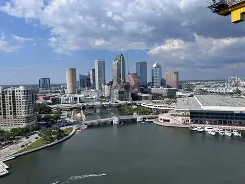 Downtown Tampa and its riverfront from above on a bright day